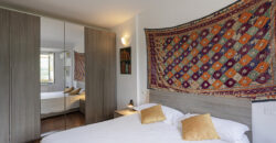 Apartment with garden and private parking