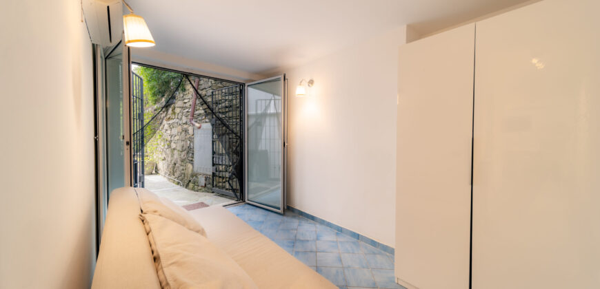 Trilocale con giardino e posto auto